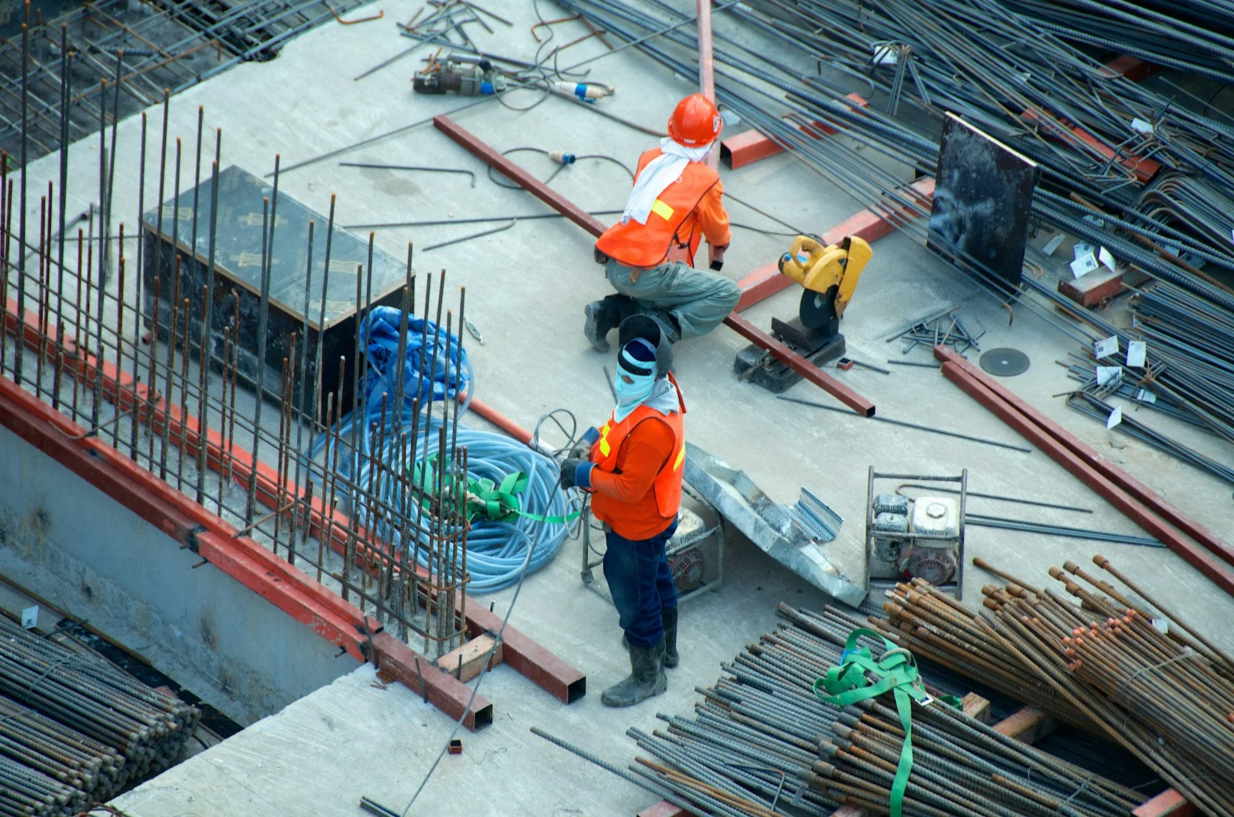 Construction crew working with materials at an active building site